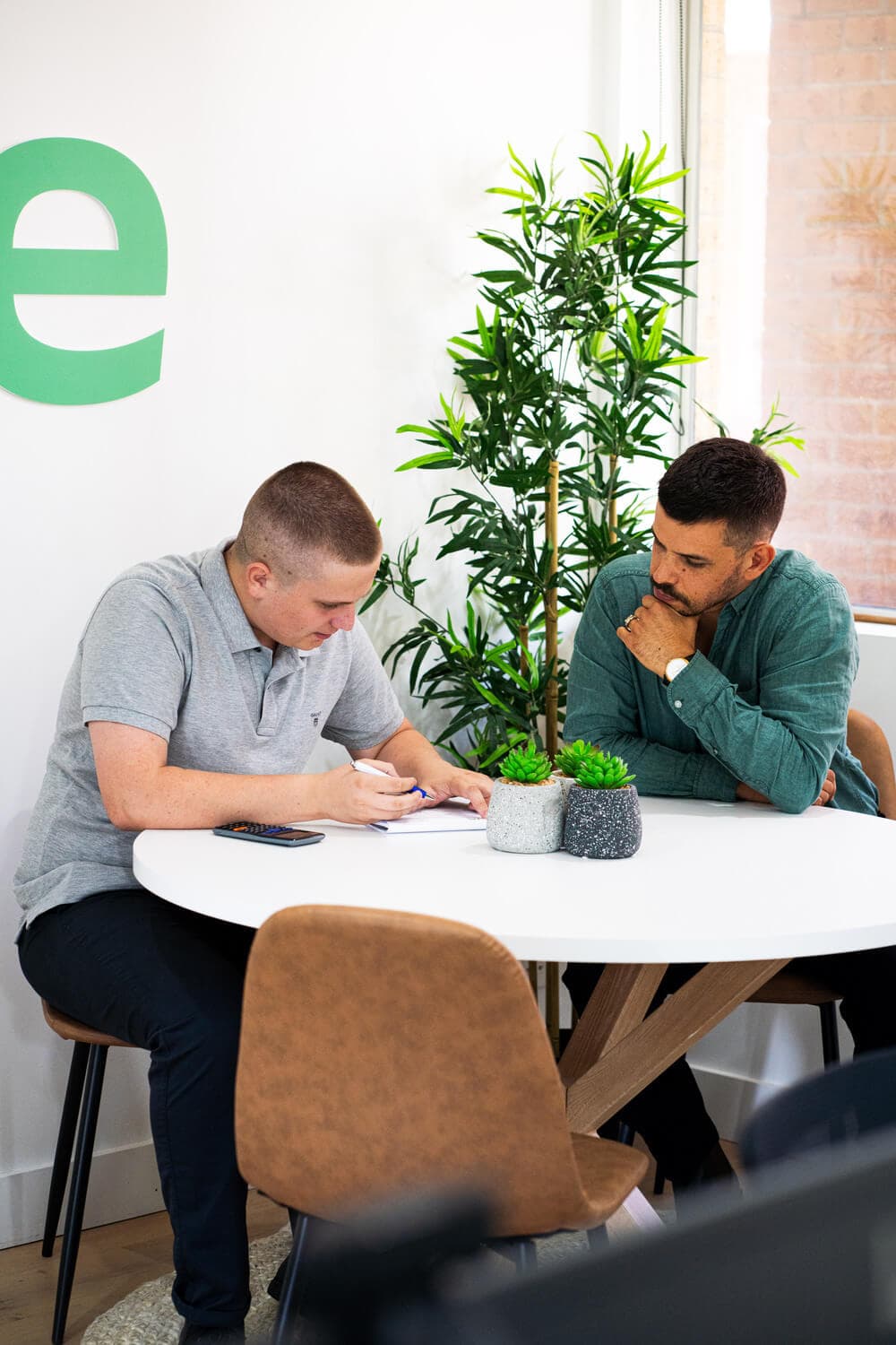 Stryve Finance team discussing contractor home loan strategies